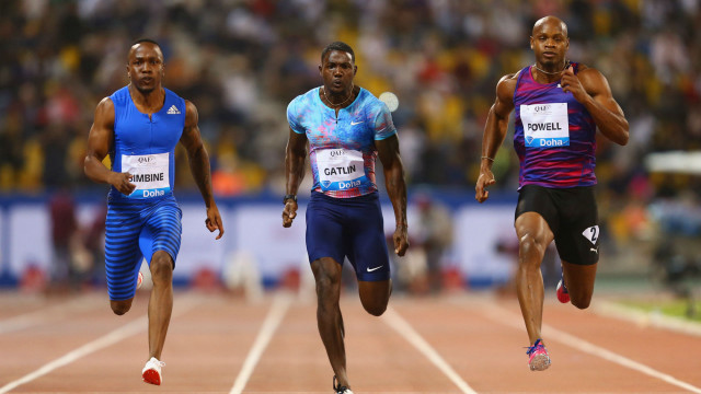 Three men running track stadium free wallpaper for desktop - medium preview image