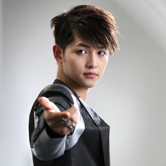 Man black shirt vest pointing free wallpaper for tablet - medium preview image