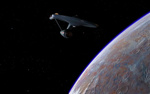 Spaceship giant planet sky stars free wallpaper for desktop - medium preview image