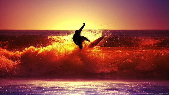 Surfer riding wave ocean sunset #6 free wallpaper for desktop - medium preview image