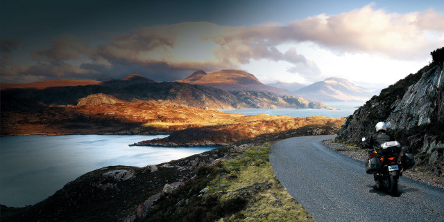 Motorcycle road mountain lake background free wallpaper for desktop - medium preview image