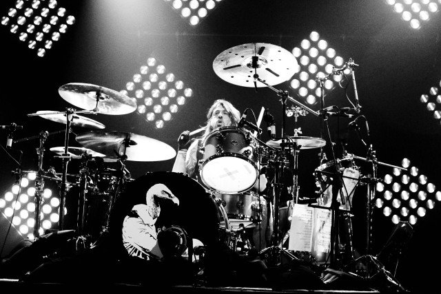 Man playing drums stage lights free wallpaper for desktop - medium preview image