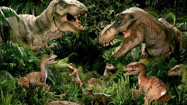 Dinosaurs jungle man trees plants free wallpaper for desktop - medium preview image