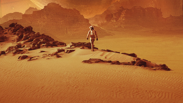 Man desert sand rocks giant free wallpaper for desktop - medium preview image