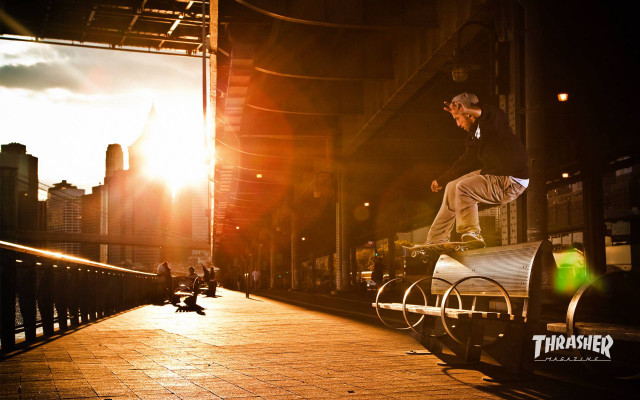 Man skateboarding rail city sunset free wallpaper for desktop - medium preview image