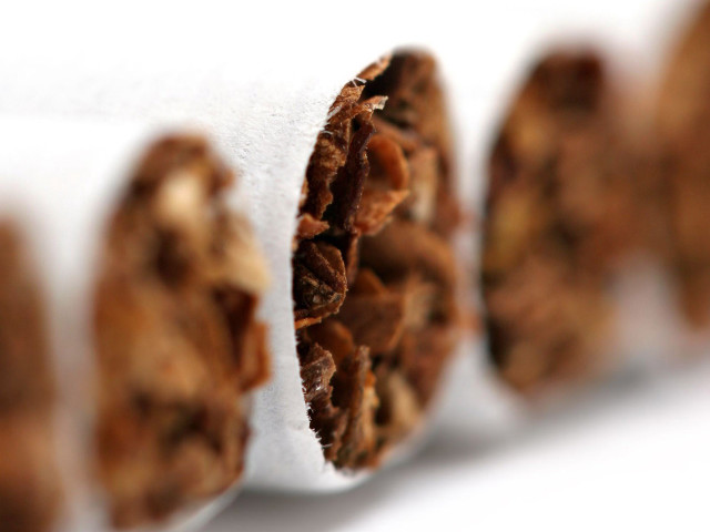 Cigarette closeup white background brown free wallpaper for desktop - medium preview image