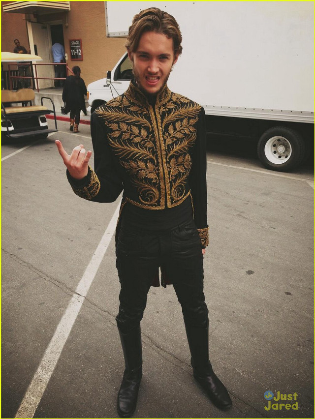 Man black gold outfit parking free wallpaper for mobile - medium preview image