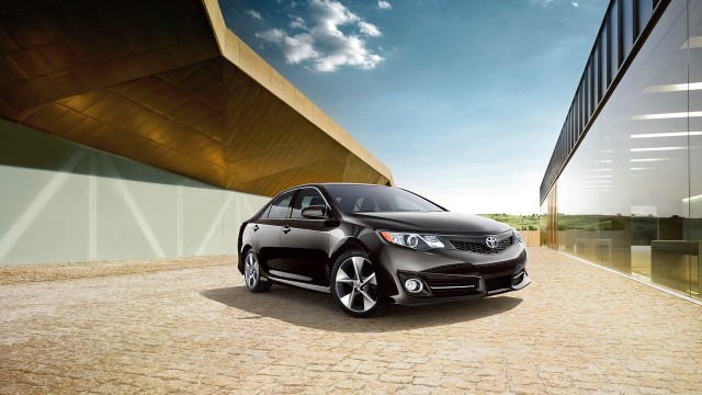 Black car parked building brick free wallpaper for desktop - medium preview image