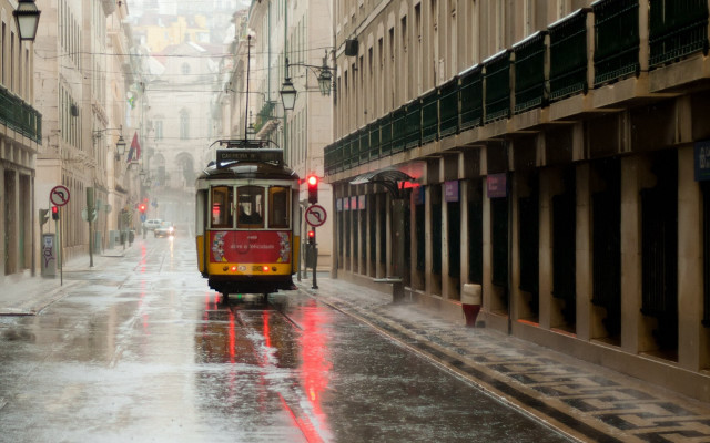 Trolley car wet street rainy free wallpaper for desktop - medium preview image