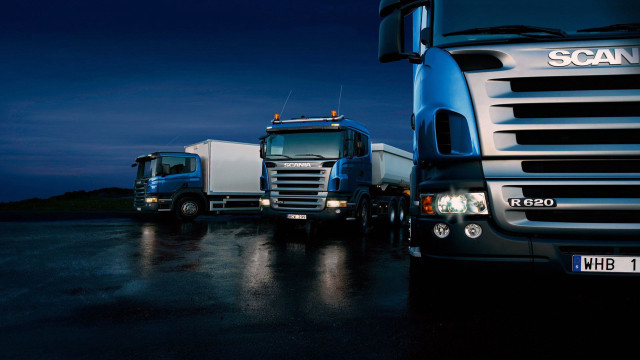 Trucks parked lot night time free wallpaper for desktop - medium preview image