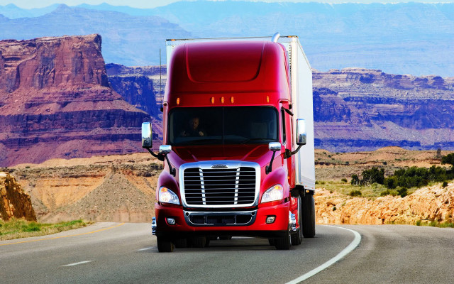 Red semi truck mountain road free wallpaper for desktop - medium preview image