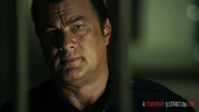 Man looking camera dark room free wallpaper for desktop - medium preview image