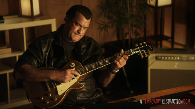 Man playing guitar room plant free wallpaper for desktop - medium preview image