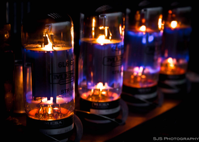 Glass tubes lit candles table free wallpaper for desktop - medium preview image