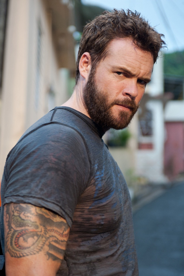 Bearded tattooed man portrait street free wallpaper for mobile - medium preview image