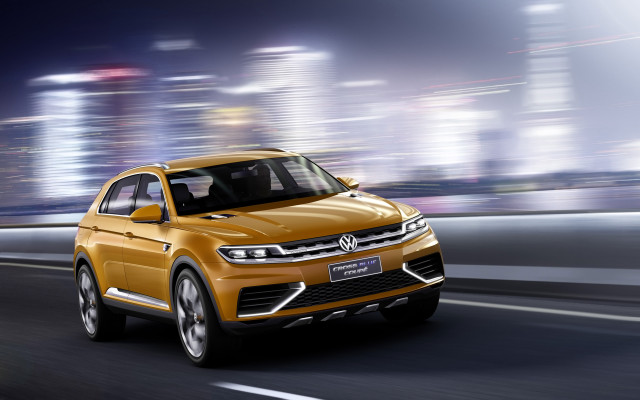 Yellow volkswagen suv night city free wallpaper for desktop - medium preview image