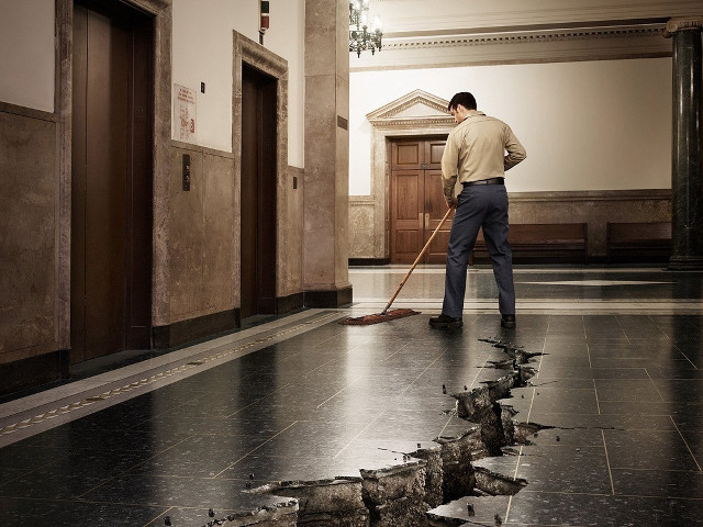 Man sweeping floor broom hole free wallpaper for desktop - medium preview image