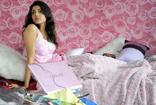 Woman sitting bed pink wallpaper free wallpaper for desktop - medium preview image