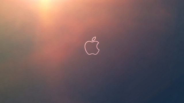 Apple logo blurry sun sky free wallpaper for desktop - medium preview image