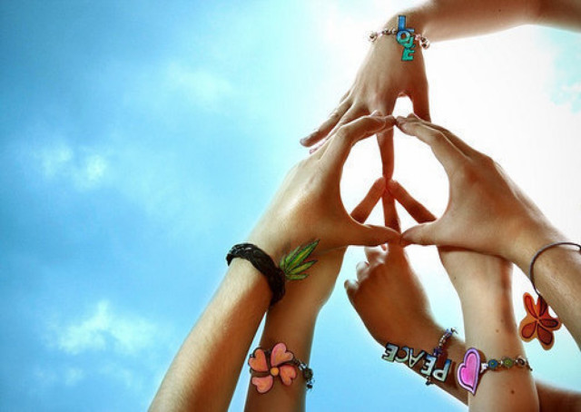 Peace sign flowers holding hands free wallpaper for desktop - medium preview image