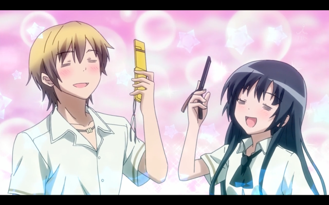 Couple holding cell phone in free wallpaper for desktop - medium preview image