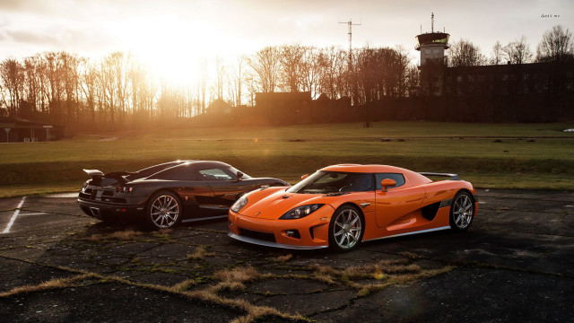 Orange sports cars parking lot free wallpaper for desktop - medium preview image