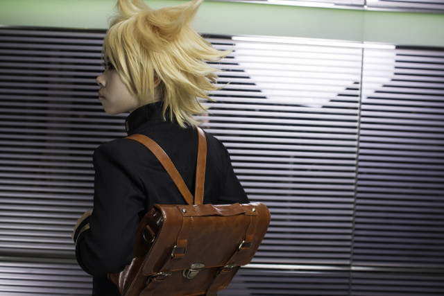 Blonde man backpack looking distance free wallpaper for desktop - medium preview image