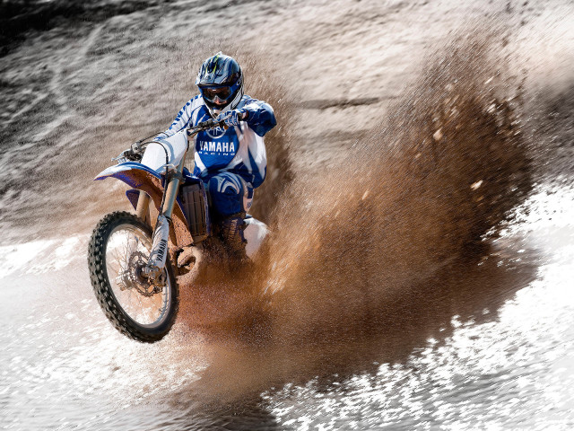 Dirt bike riding water puddle free wallpaper for desktop - medium preview image