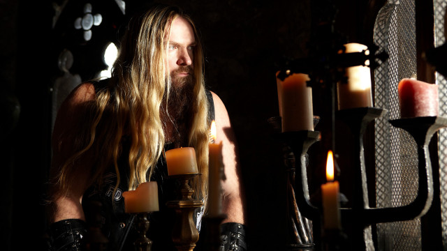 Man long hair leather gloves free wallpaper for desktop - medium preview image