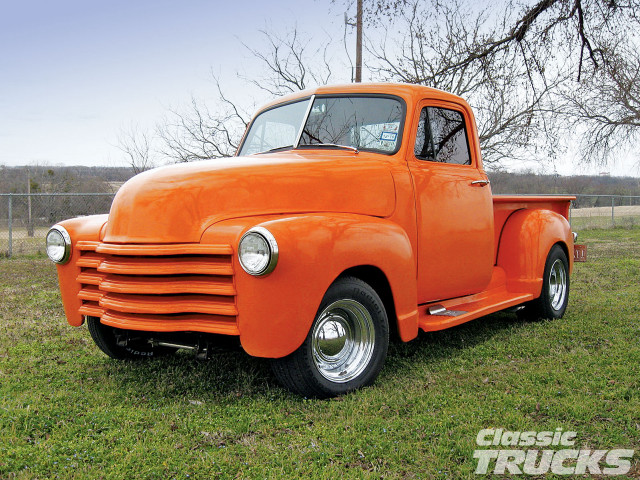 Orange truck parked field grass free wallpaper for desktop - medium preview image