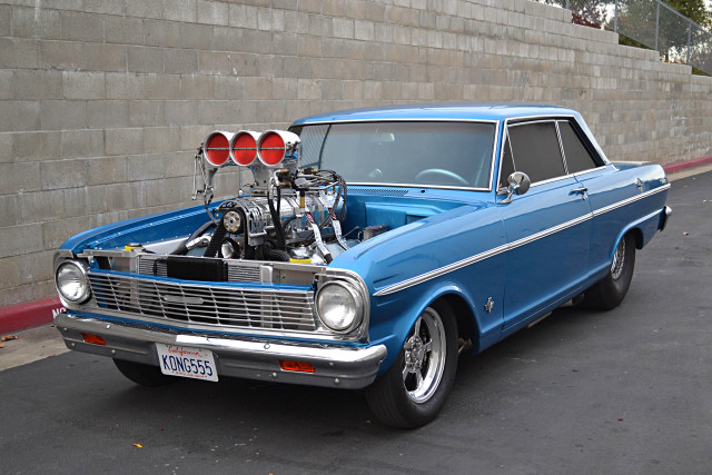 Blue car engine hood parked free wallpaper for desktop - medium preview image