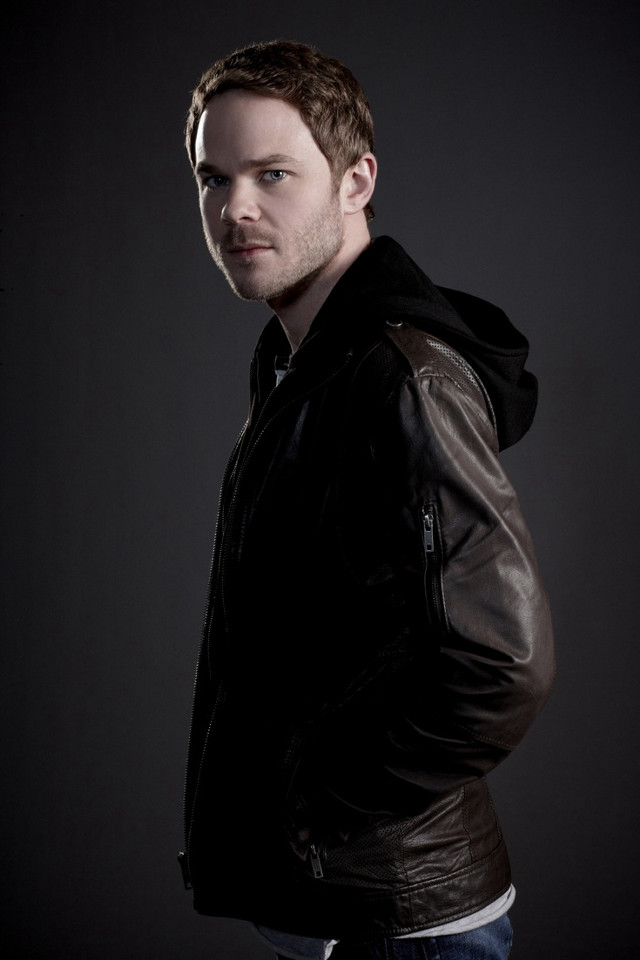 Man leather jacket posing hands free wallpaper for mobile - medium preview image