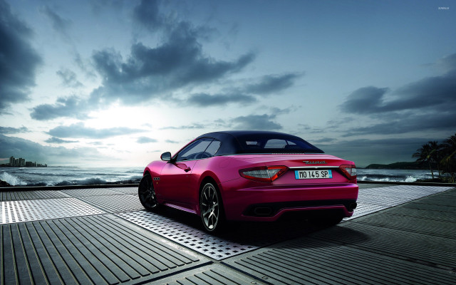 Pink sports car boardwalk ocean free wallpaper for desktop - medium preview image