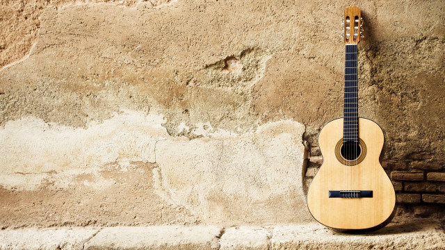 Guitar stone wall brick background free wallpaper for desktop - medium preview image