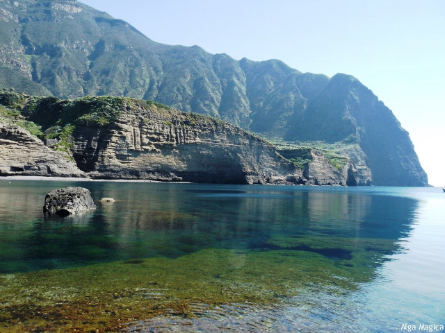 Water mountain rock outcropping scenery free wallpaper for desktop - medium preview image