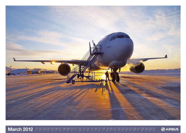 Plane parked runway sunset sunshine free wallpaper for desktop - medium preview image