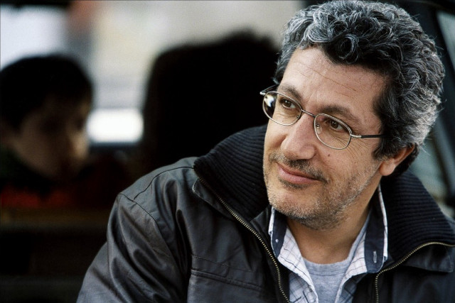 Man glasses sitting car serious free wallpaper for desktop - medium preview image