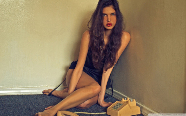 Woman sitting floor phone cord free wallpaper for desktop - medium preview image