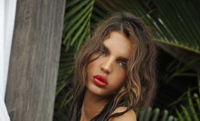 Blonde woman palm leaves curtains free wallpaper for desktop - medium preview image