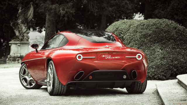 Red sports car stone wall free wallpaper for desktop - medium preview image