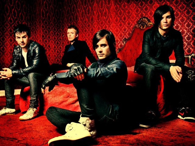 Men sitting red couch carpet free wallpaper for desktop - medium preview image