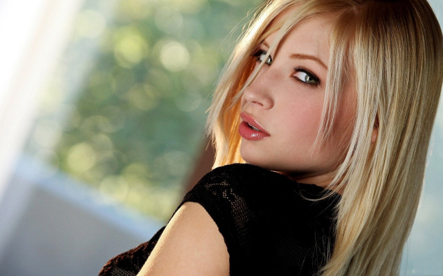 Blonde woman black top serious #2 free wallpaper for desktop - medium preview image