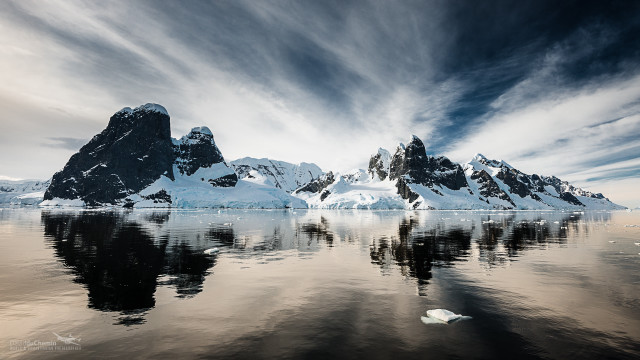 Mountain range lake icebergs cloudy free wallpaper for desktop - medium preview image