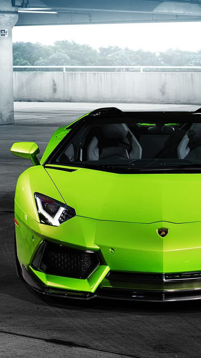 Green sports car parking garage #3 free wallpaper for mobile - medium preview image