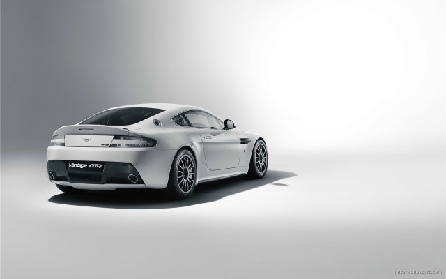 White sports car studio setting free wallpaper for desktop - medium preview image