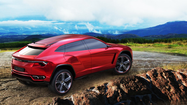 Red sports car rocky road #2 free wallpaper for desktop - medium preview image