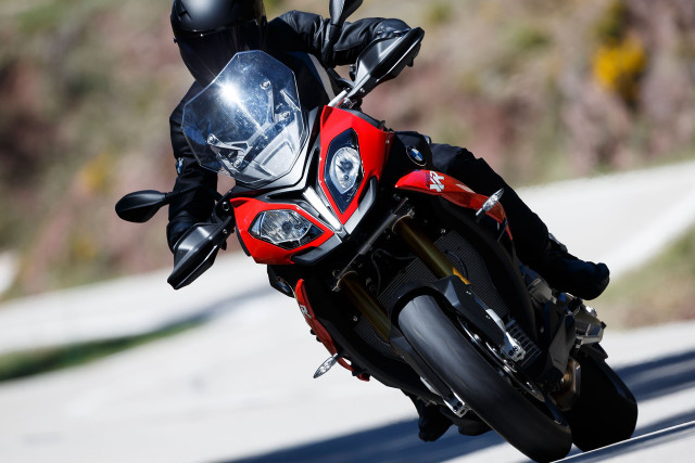 Person riding motorcycle road helmet free wallpaper for desktop - medium preview image