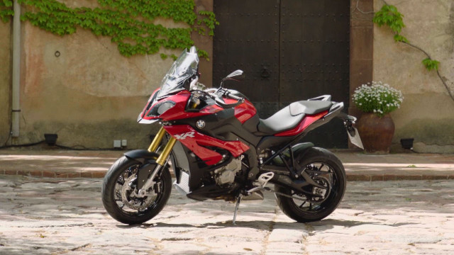 Red motorcycle cobblestone street ivy free wallpaper for desktop - medium preview image