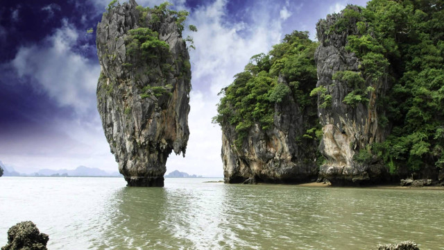 Rocks beach boat people standing free wallpaper for desktop - medium preview image