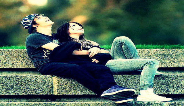 Romantic man woman smiling outdoors free wallpaper for desktop - medium preview image